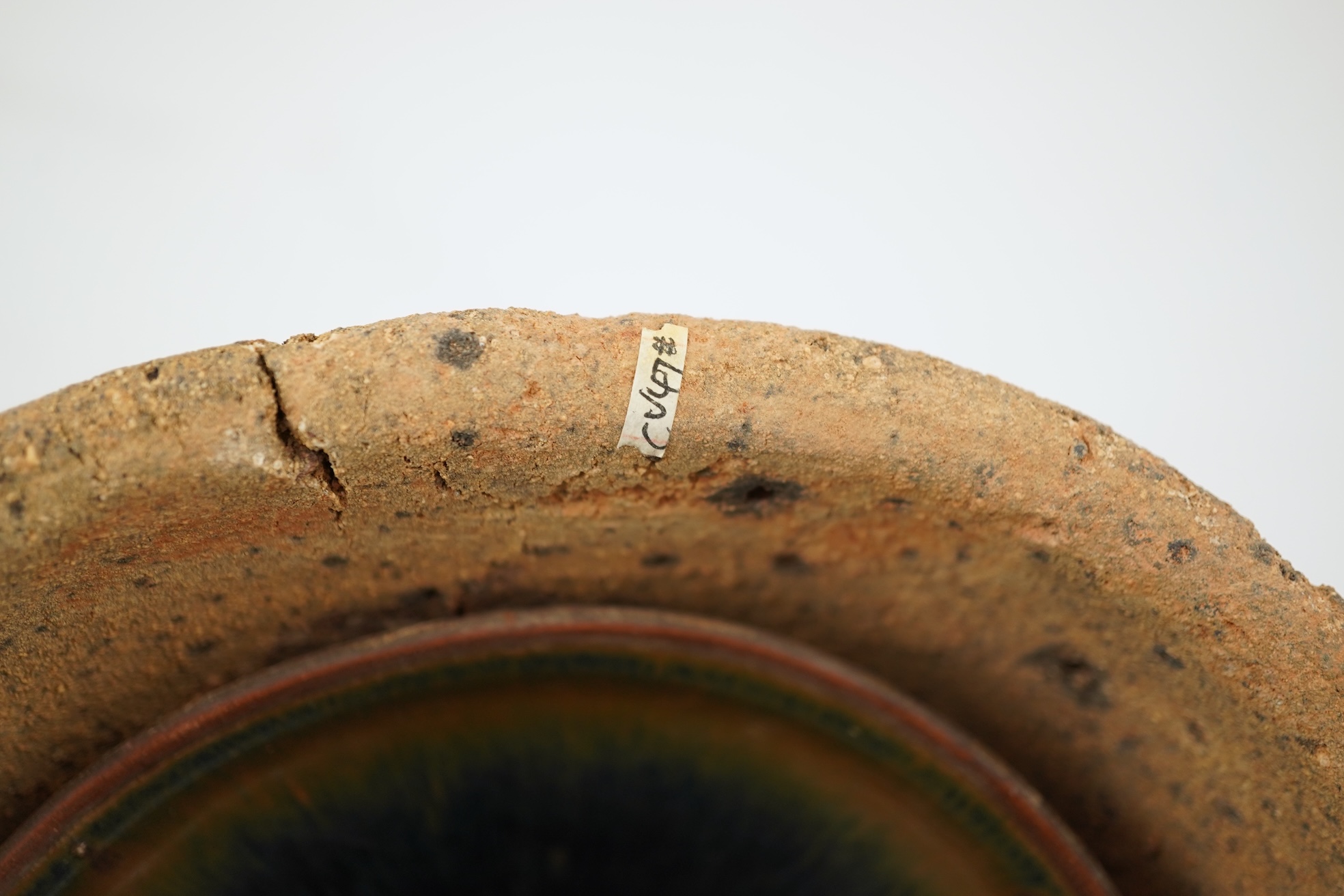 A Chinese Jian ware hare's fur bowl and saggar, Song dynasty